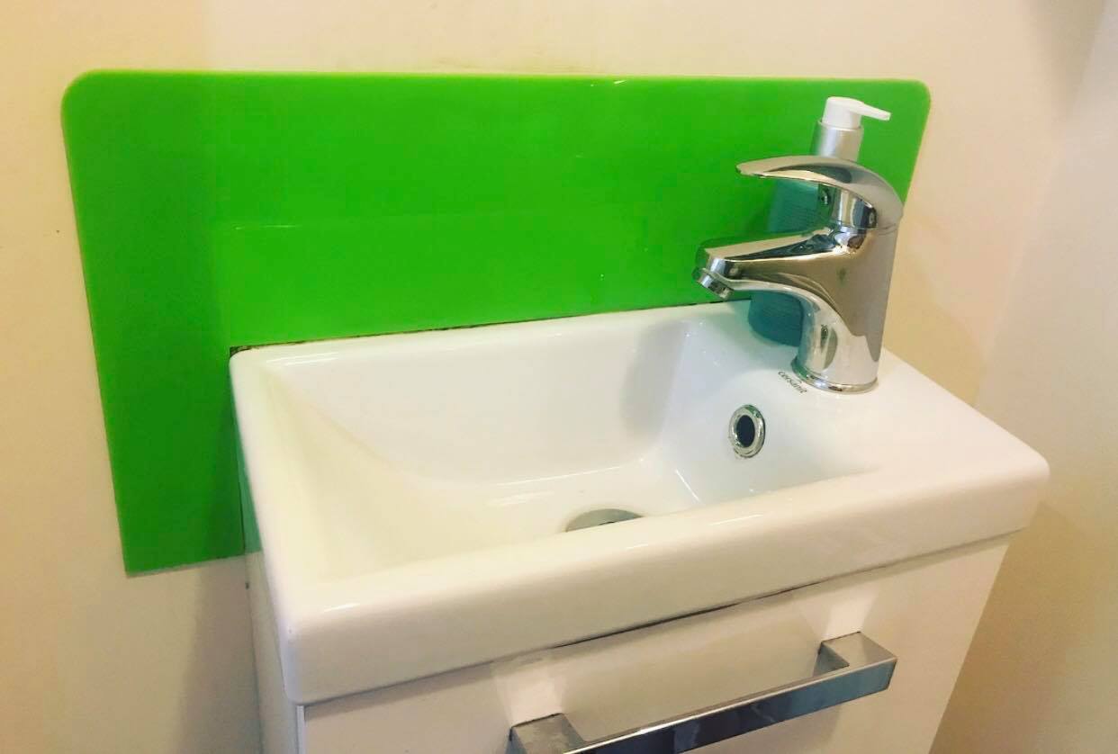 green sink splashback close up